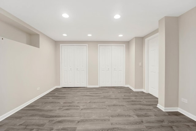 basement featuring dark wood-type flooring