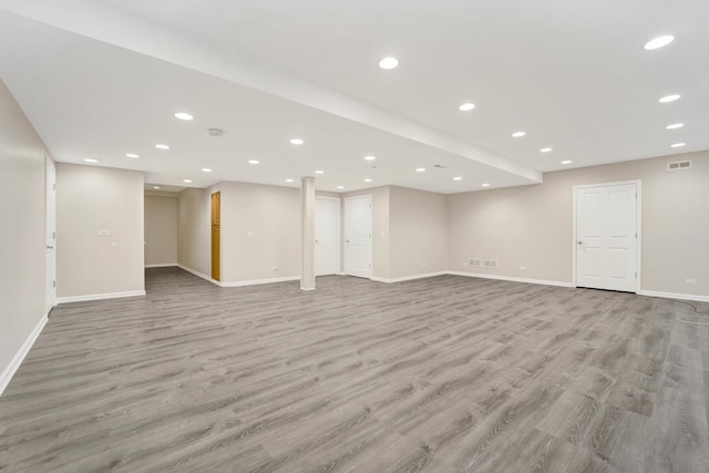 basement featuring light wood-type flooring