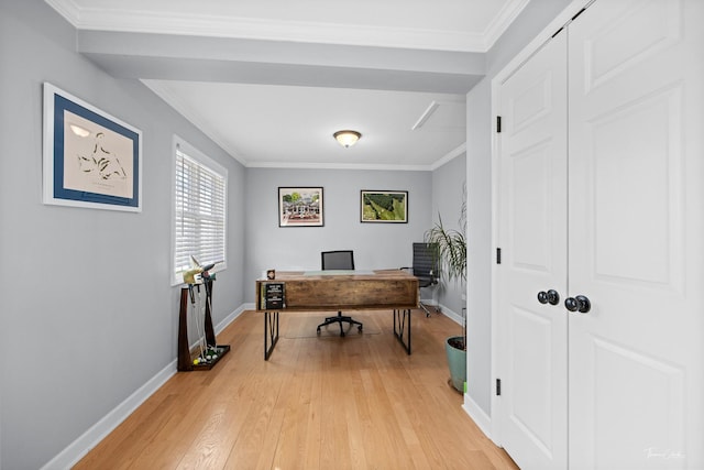 office featuring light wood-type flooring and crown molding