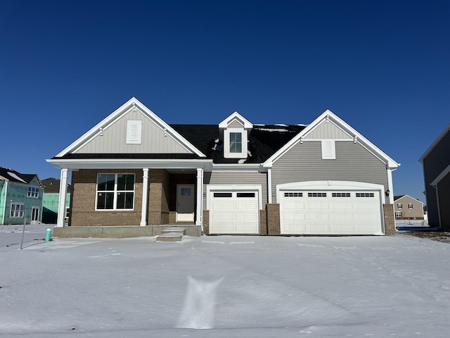 view of front of property with a garage