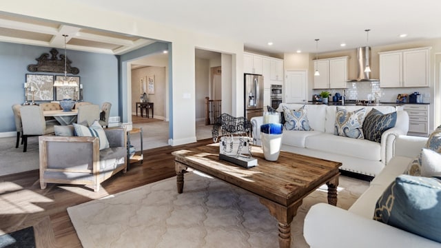 living room with wood-type flooring, beam ceiling, and coffered ceiling