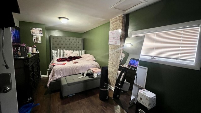 bedroom featuring dark hardwood / wood-style floors