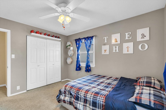 bedroom featuring carpet floors, a closet, and ceiling fan