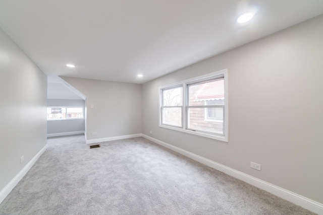 view of carpeted spare room