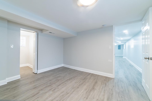 unfurnished room featuring light hardwood / wood-style flooring