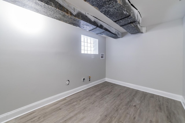 basement featuring hardwood / wood-style floors