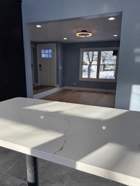 interior space with dark tile patterned floors