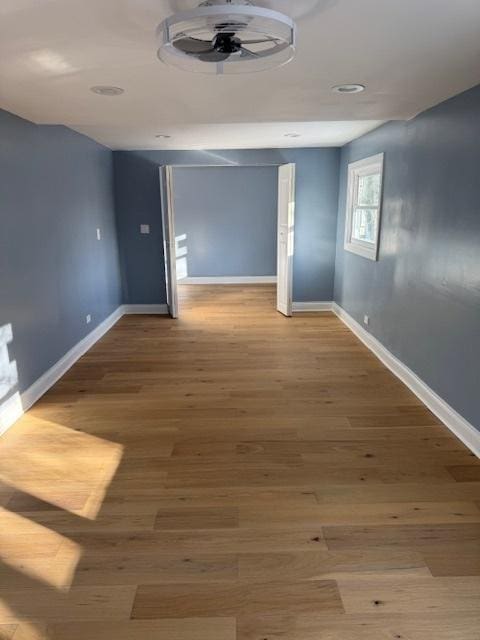 spare room with light hardwood / wood-style floors