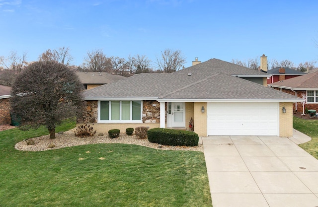 ranch-style home with a front lawn and a garage