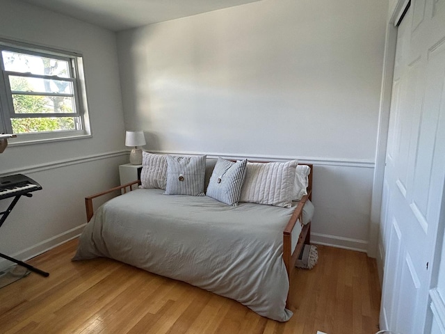 bedroom with light hardwood / wood-style flooring