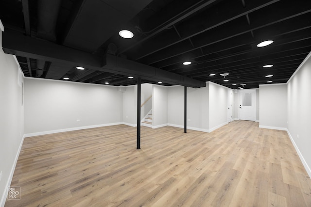 basement with light wood-type flooring