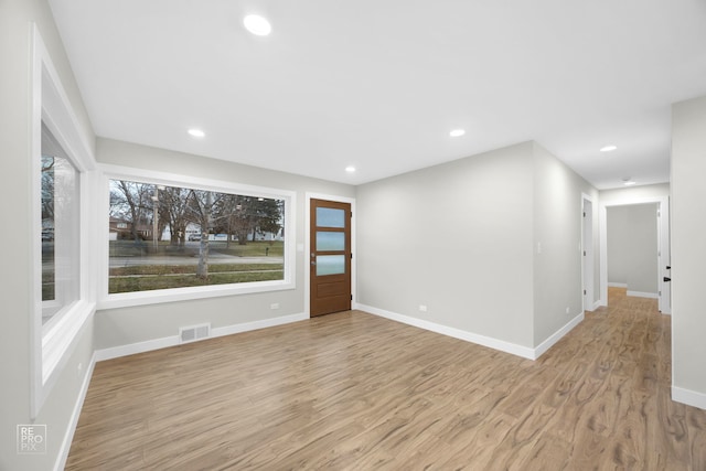 empty room featuring light hardwood / wood-style floors