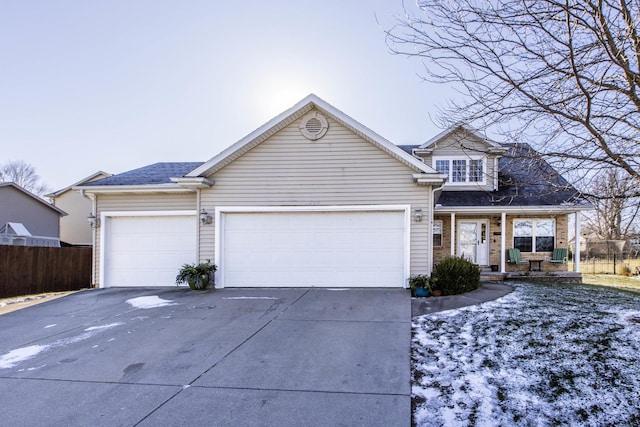 view of front of home with a garage