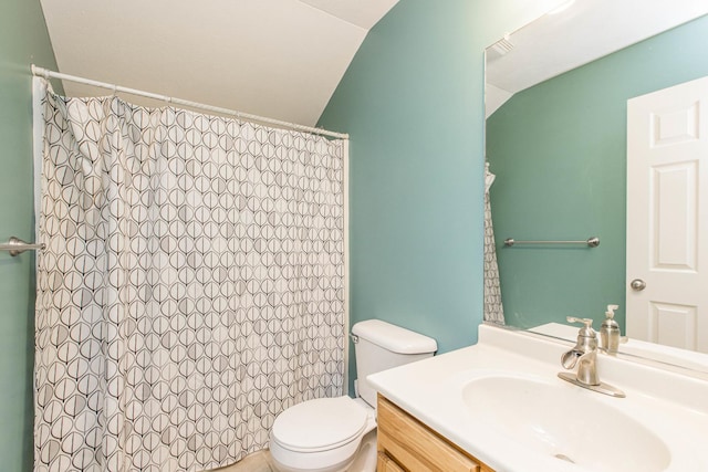 bathroom with a shower with curtain, vanity, toilet, and lofted ceiling