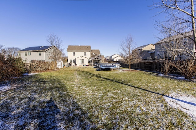 view of yard with a trampoline