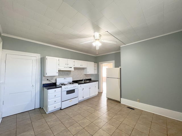 kitchen featuring white cabinets, white appliances, and crown molding