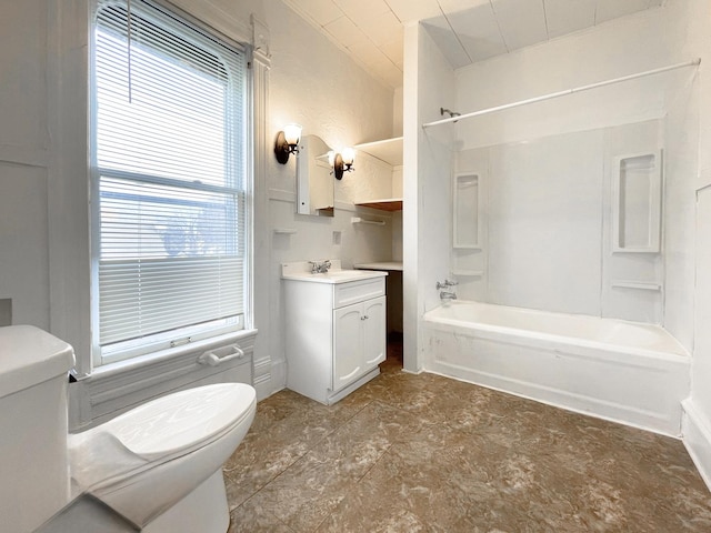 full bathroom with toilet, vanity, bathing tub / shower combination, and a healthy amount of sunlight