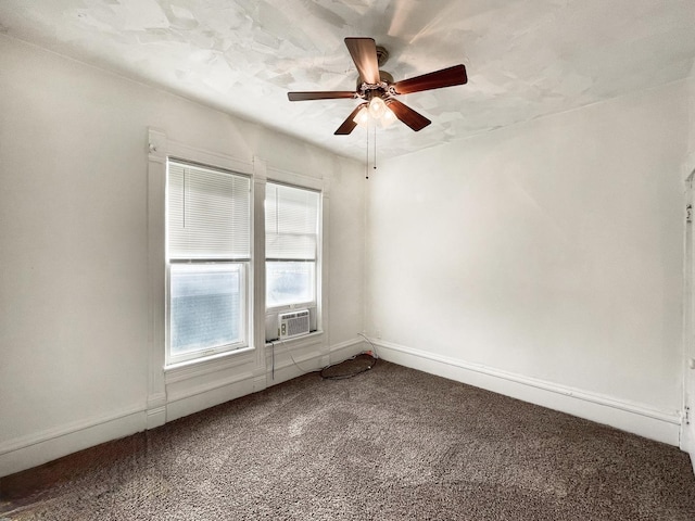 carpeted empty room featuring ceiling fan and cooling unit