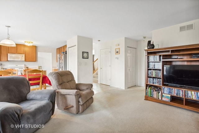 living room with light carpet