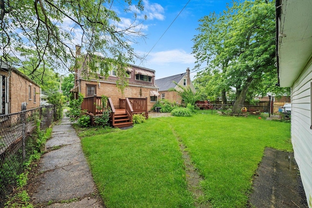 view of yard featuring a deck