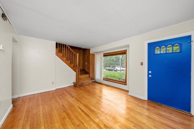 entryway with light hardwood / wood-style flooring