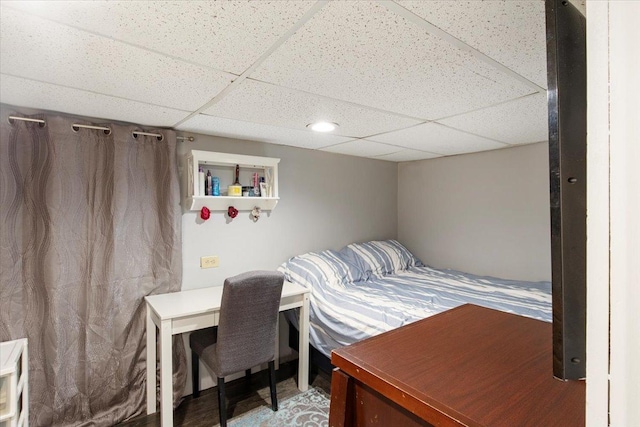 bedroom featuring a paneled ceiling