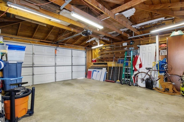 garage featuring a garage door opener