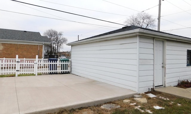 view of side of home with a patio