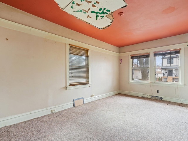 spare room with carpet floors