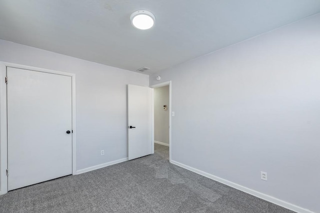 unfurnished bedroom featuring carpet flooring