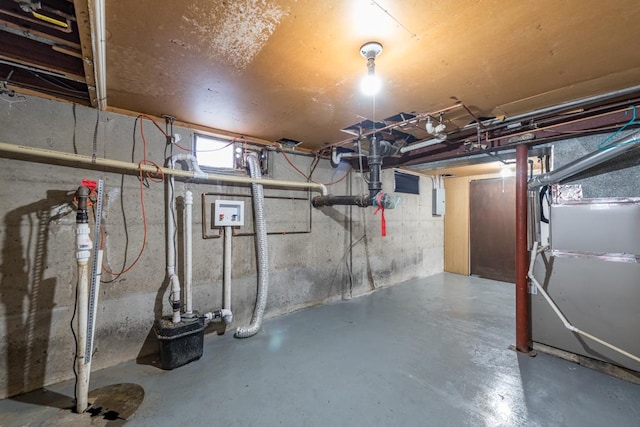 basement featuring heating unit