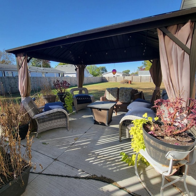 view of patio with a gazebo and an outdoor living space