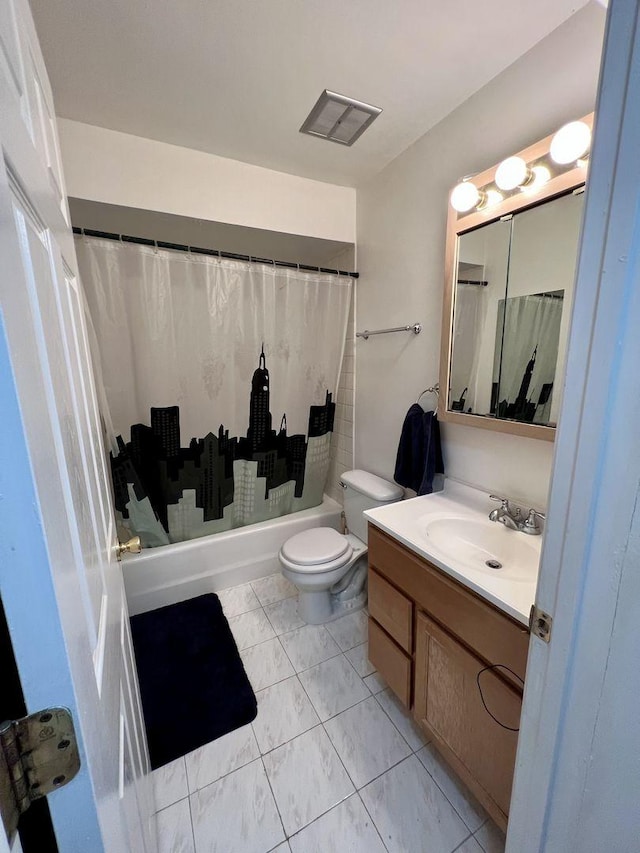 full bathroom featuring toilet, vanity, and shower / tub combo