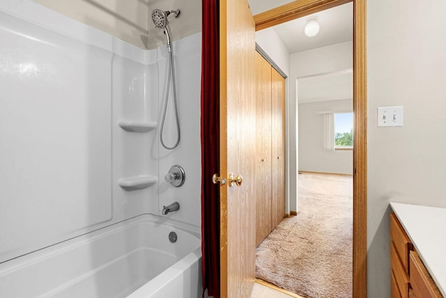 bathroom featuring vanity and bathing tub / shower combination