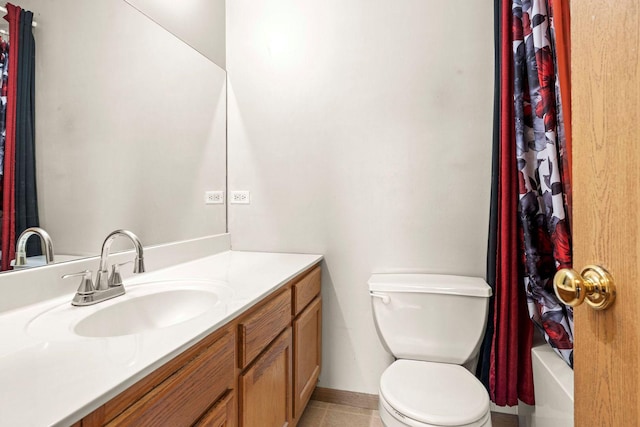 full bathroom featuring tile patterned floors, vanity, shower / bath combination with curtain, and toilet