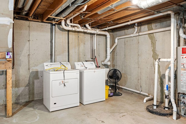 basement with washer and clothes dryer