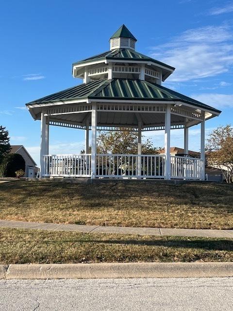 surrounding community featuring a gazebo and a yard