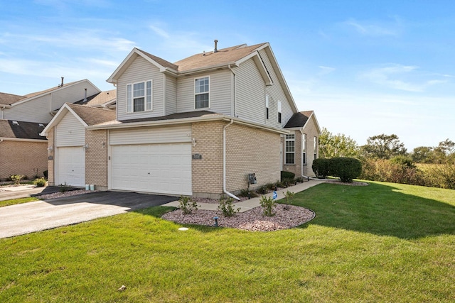 view of front facade featuring a front lawn and a garage