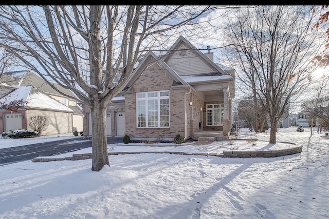 front of property with a garage