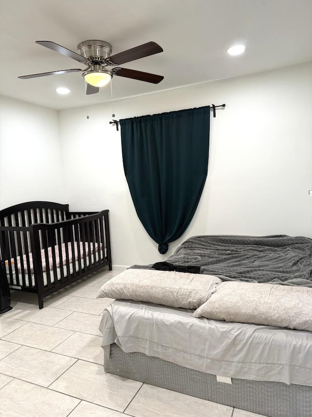 tiled bedroom with recessed lighting and ceiling fan