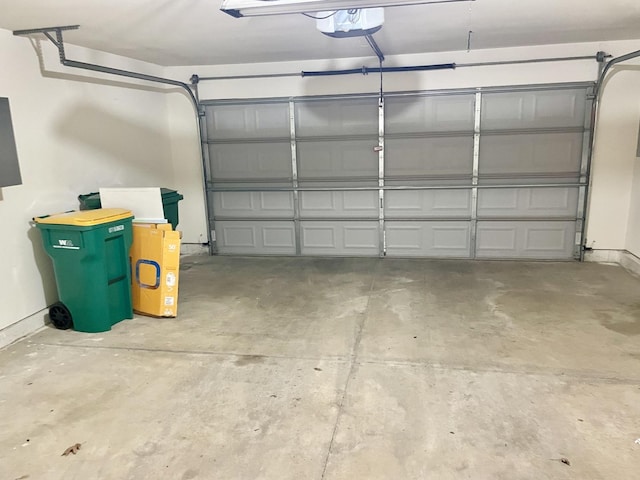 garage featuring a garage door opener