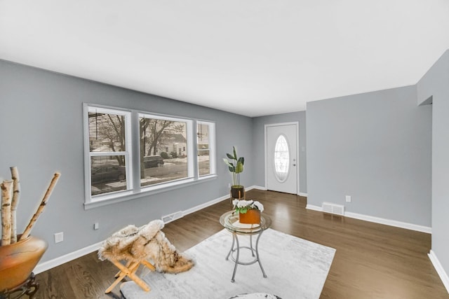 interior space with dark hardwood / wood-style flooring