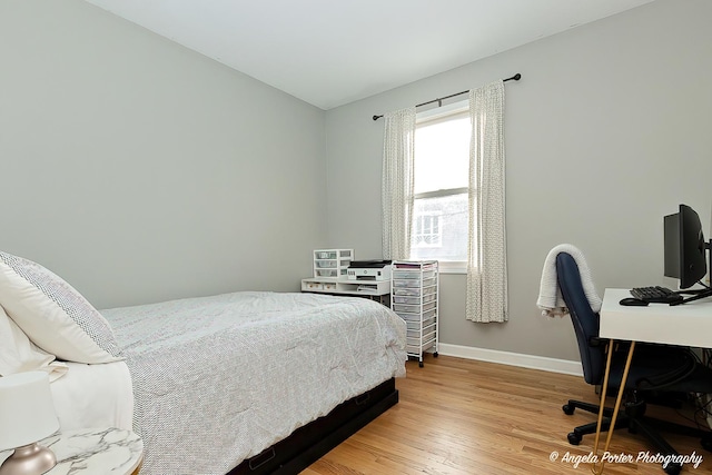 bedroom featuring light hardwood / wood-style floors