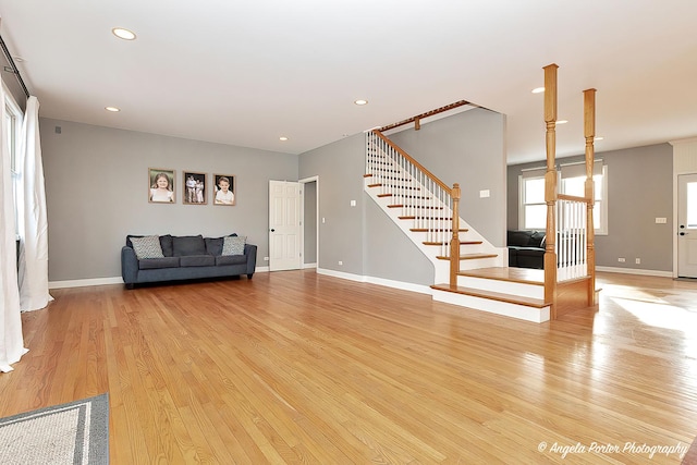 unfurnished living room with light wood-type flooring