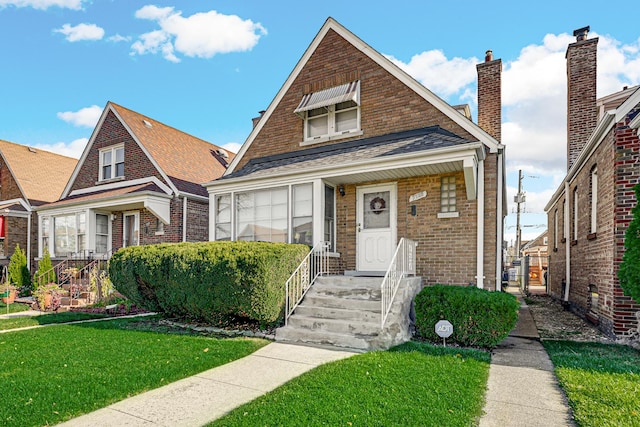 view of front of home with a front yard