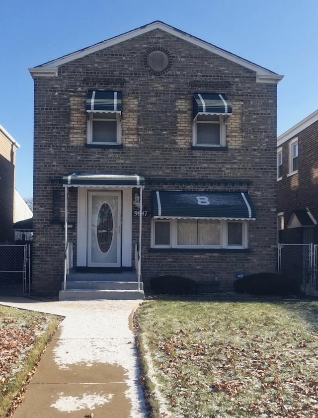 view of front of home featuring a front lawn