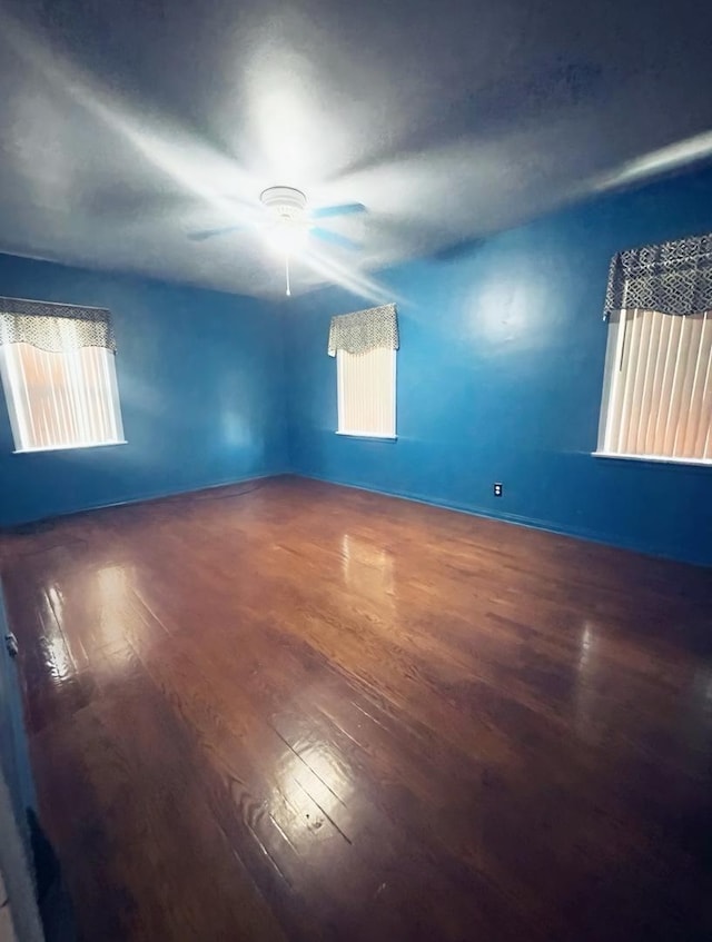 spare room featuring hardwood / wood-style flooring