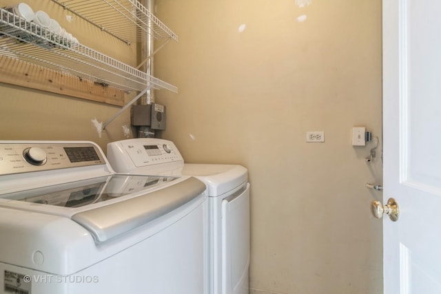 laundry room with washer and clothes dryer