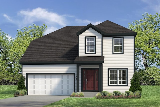 view of front of house with a front lawn and a garage