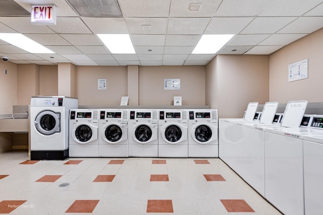 clothes washing area featuring washer and dryer